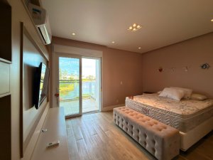 Casa em Condomínio com 230m², 4 dormitórios, 4 suítes, 2 vagas, Condomínio Rossi  Atlântida em Xangri-Lá