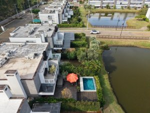 Casa em Condomínio com 230m², 4 dormitórios, 4 suítes, 2 vagas, Condomínio Rossi  Atlântida em Xangri-Lá