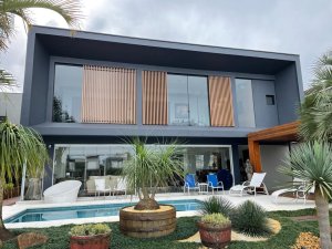 Casa em Condomínio com 550m², 5 dormitórios, 3 suítes, 2 vagas, Condomínio Bosques de Atlântida em Xangri-Lá