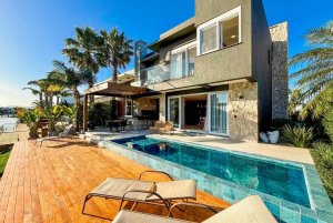 Casa em Condomínio com 265m², 5 dormitórios, 5 suítes, 2 vagas, Condomínio Malibu Beach Residence em Xangri-Lá
